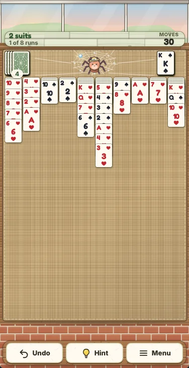 Actual Dewdrop Garden Solitaire gameplay on a phone-sized screen: the same two-suit deal, with the move counter across the top, the stock, Thimble’s web and the finished run in a row above ten narrow columns, and Undo, Hint and Menu at the bottom.