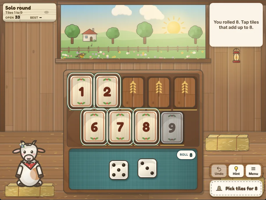 Actual Meadowlark Barn Shut the Box gameplay on a desktop browser: the wooden box in the middle of a hayloft under the open loft door, its cream number tiles in two rows with several flipped down to wooden backs, two ivory dice in the teal felt tray with the roll total on a chip, Posy the goat on her hay bale at the left under the counters sign, and the message, Undo, Hint and Menu and the big button on the right.